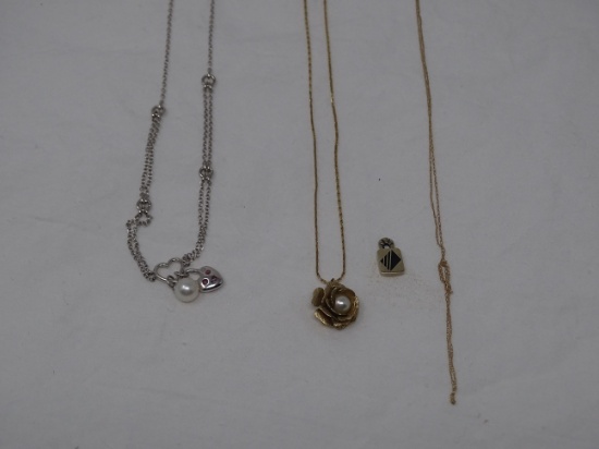 Gold necklaces and charm
