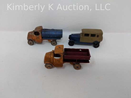 3 Cast metal toy trucks