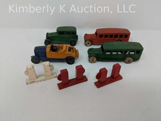 4 Cast metal toy cars, cast toy gas pumps