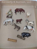 11 Cast metal animal, etc. figures.