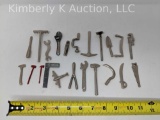 22 Miniature cast metal tools or game pieces