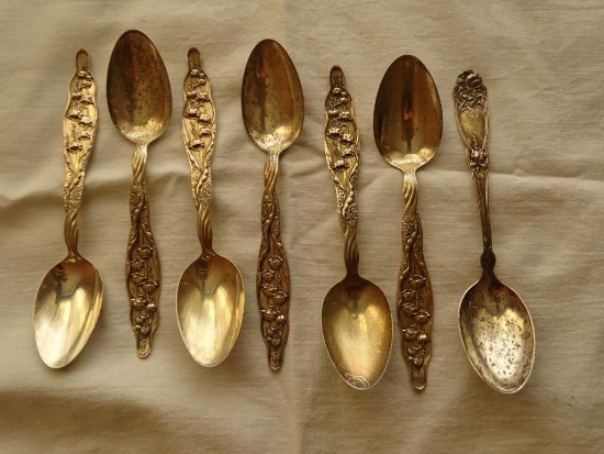 7 Sterling tea spoons