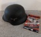 Helmet with German Swastika and booklet