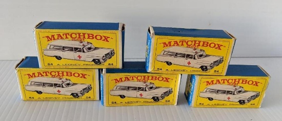 5 Matchbox cars in boxes