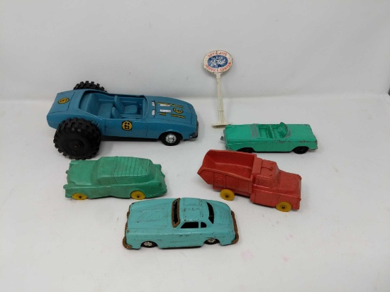 Five Vintage Toy Cars and Service Center Sign