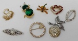 Eight Costume Brooches