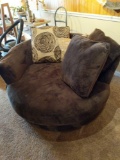 Circular Shaped Swivel Chair with Pillows