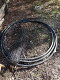 Roll of Wire Fencing and Black Hose