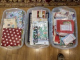 3 Totes full of Table Linens, Yard Flags, Etc.