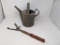 Galvanized Watering Can and Clay Pigeon Thrower
