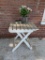 Folding Wooden Patio Table, Flower Arrangement and 2 Glass Candle Holders