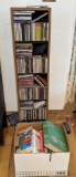 Large Grouping of DVDs and Books and Bookshelf