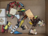 Grouping of Miniature Birds and People