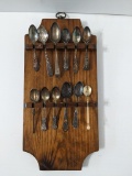 12 Spoons in Wooden Wall Display