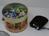 Tin and Pouch with Marbles