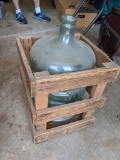 Plastic Water Bottle in Wooden Crate