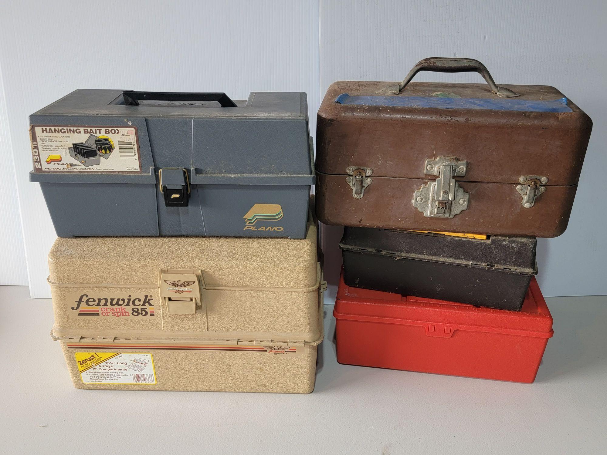 Bundle of empty vintage plastic fishing tackle boxes