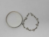 Two Sterling Bracelets with Whale Motif