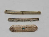 Three gold Bar Pins