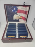 Display case with 50 State Quarter Collection.