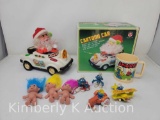 Smurf Figures and Mug; Trolls; and Cartoon Car with Santa in Box