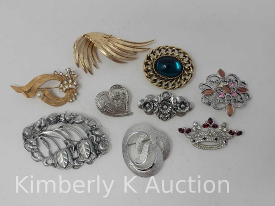 9 Costume Brooches