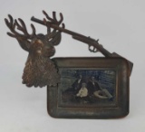 Frame with Stag Head and Long Gun with Picture of Men and Boy Seated at Tree