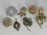 6 Costume Brooches and a Pendant