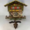 Swiss Chalet Style Cuckoo Clock with Figural Decoration