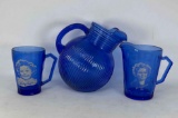 Cobalt Glass Pitcher with a Shirley Temple Mug and Creamer