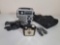 Eton Emergency Radio/Light/Cell Phone Charger, Olympus Zoom2000 Camera, Kodak Brownie Bullet Camera