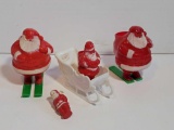 4 Vintage Plastic Santa- 2 Santa on Skis Candy Containers, Santa in Sleigh and Miniature Santa