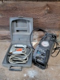 Black & Decker Jig Saw in Case and Campbell Hausfeld Battery Charger