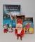 2 Christmas Books, Mechanical Santa Skiier with Box, Santa & Mrs. Claus Shakers