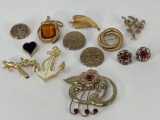 10 Costume Brooches and one Pendant - One Brooch with Matching Earrings