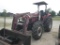 Case IH JX75 tractor with loader and spear