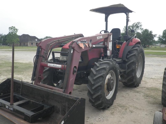 Case IH JX75 tractor with loader and spear