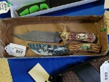 2 Knives with deer and wolf graphics