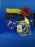 Crate with Extension Cords and a Air Hose