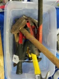 Tote of Hammers and Pipe Wrenches