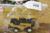 Bag of  New Holland Combine Toy