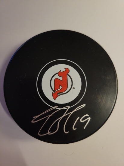 Travis Zajak New Jersey Devils Autographed Hockey Puck Hologram