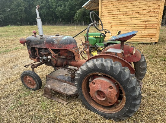 Farmall Cub tractor with belly mower running