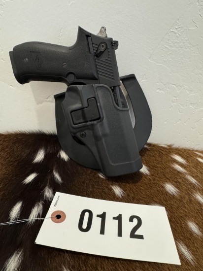 American tactical FireFly .22 with paddle holster