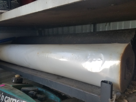 roll of plastic and roofing paper