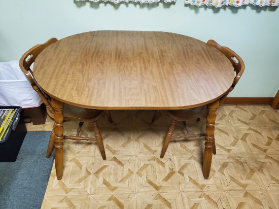 oval kitchen table with 2 chairs