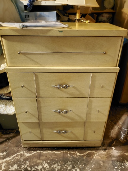 drawers chest next to hot water heater