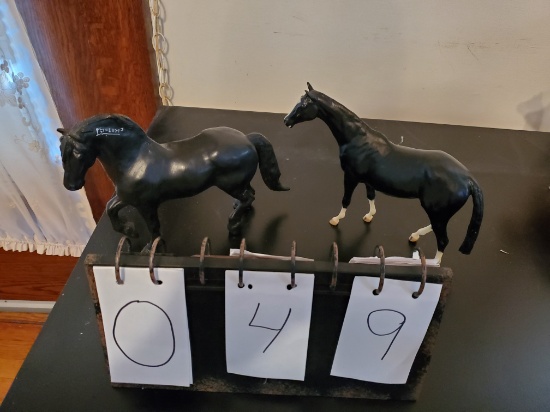 pair of black horse figures