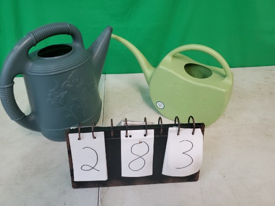 2 watering jugs