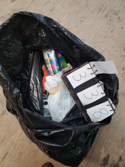 Bag of Christmas items and clothes hangers
